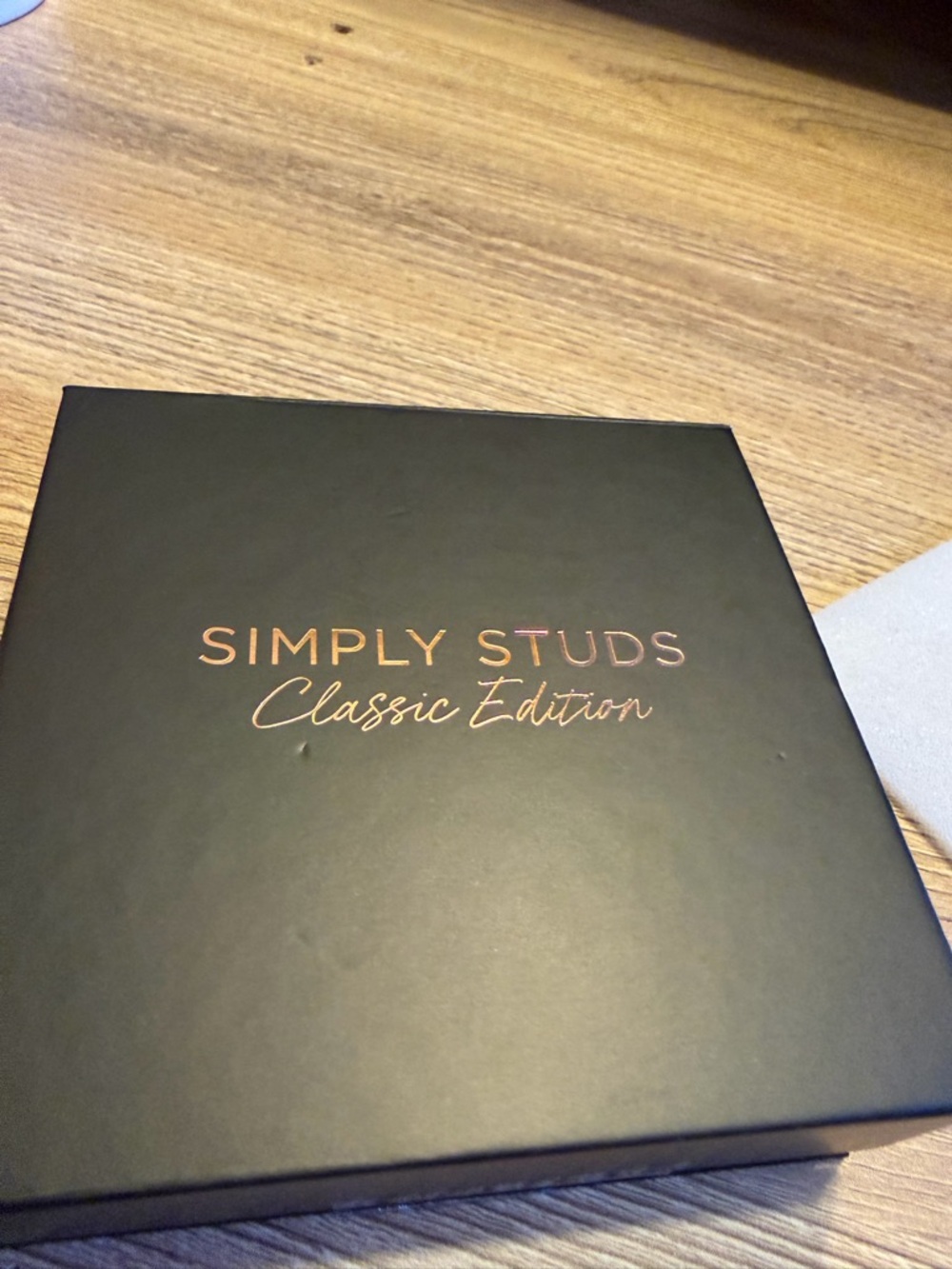 Simply Studs Classic Edition Earrings - Black and Gold Packaging